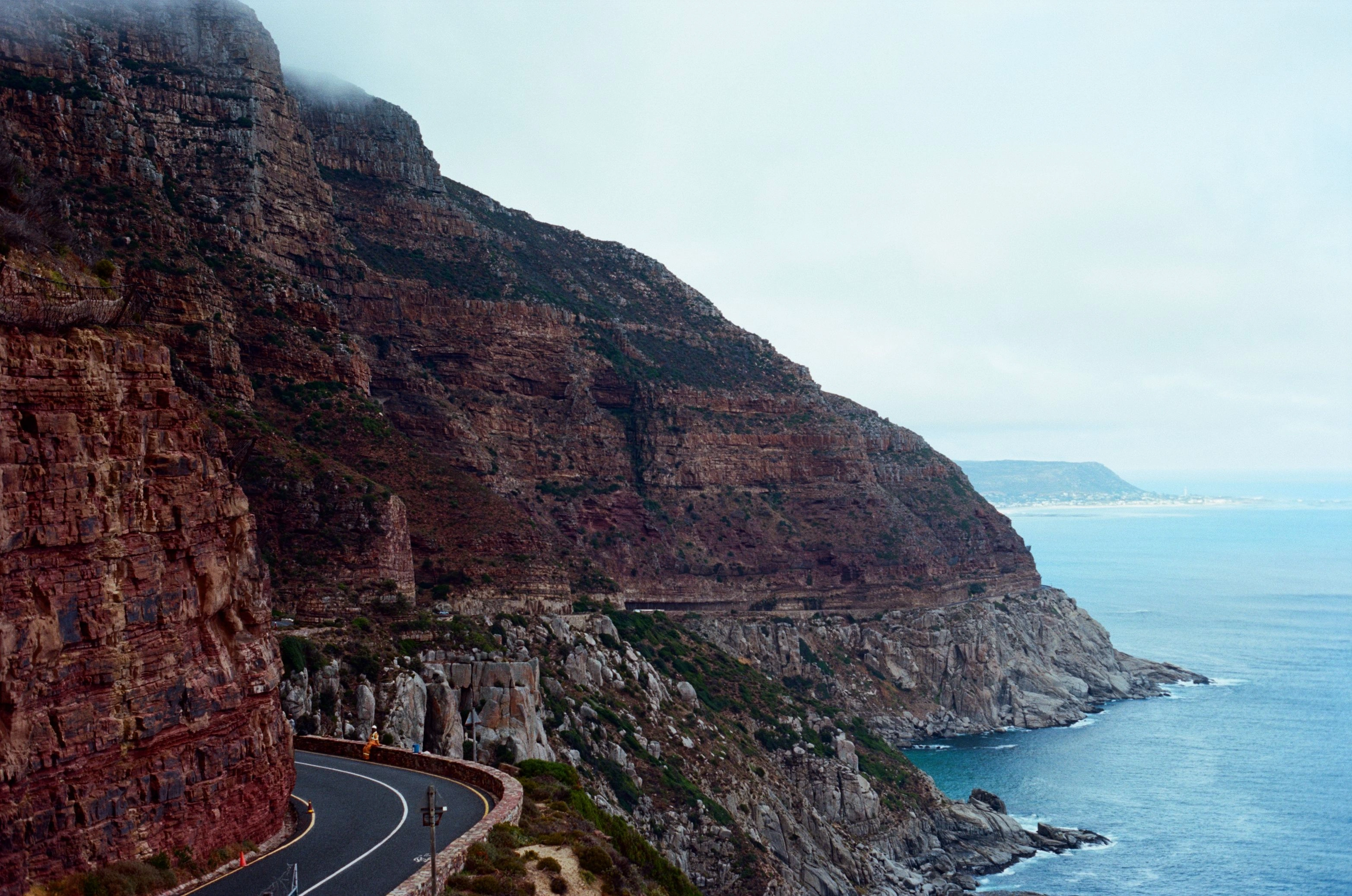 Chapman’s Peak Drive curving beneath rocky cliffs beside the Atlantic Ocean